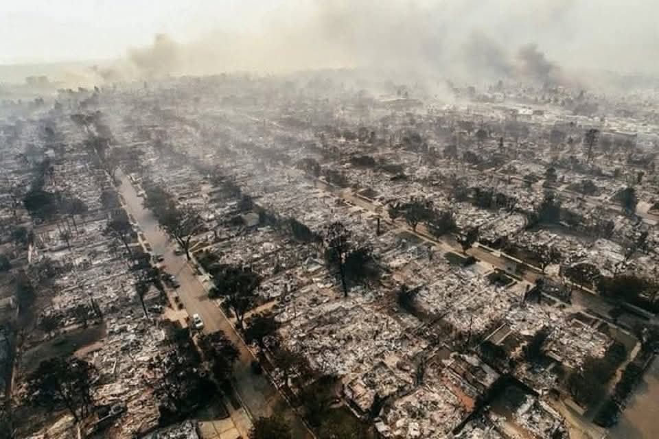 Families in shock begin to visit their charred homes in the Los Angeles area